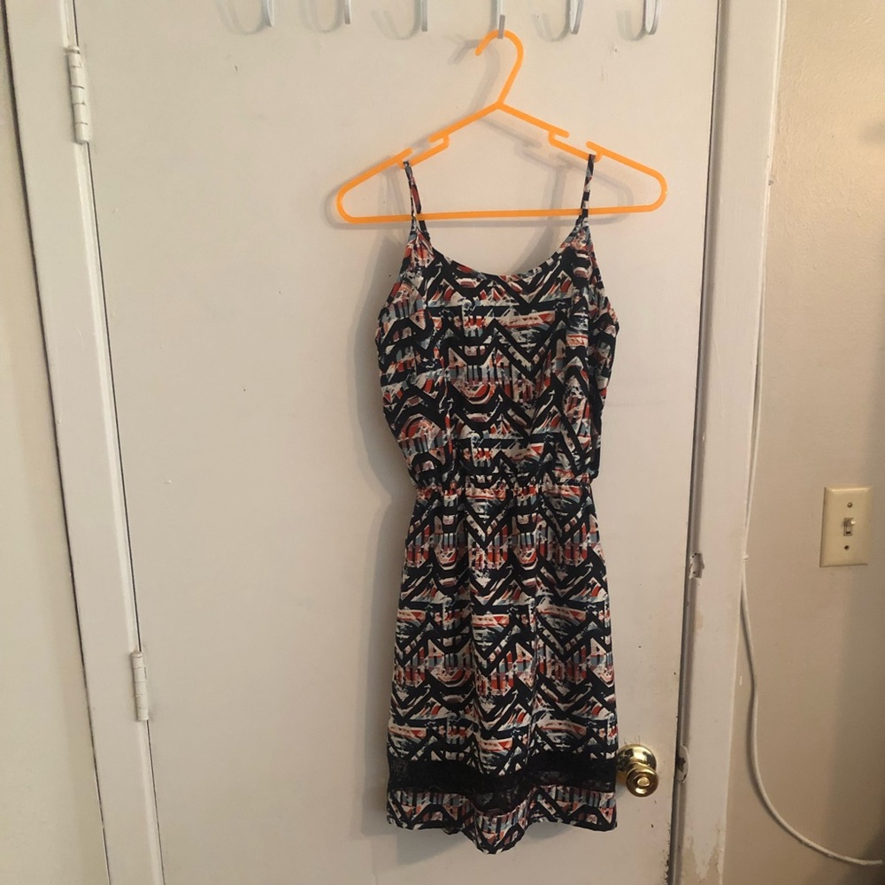 An Indulge, size S, black dress.